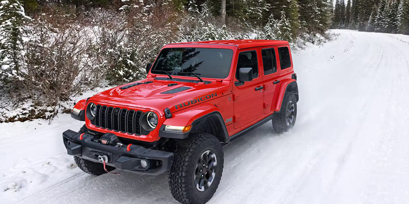 Red 2026 Jeep Wrangler Rubicon in the snow