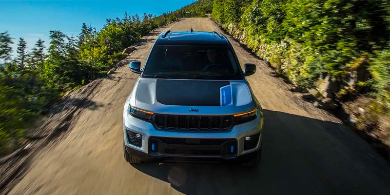 Grand Cherokee Trailhawk on mountain dirt road